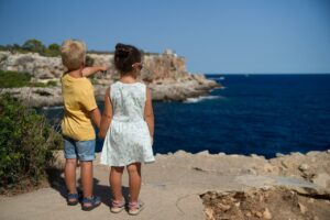 Two kids watching the Sea